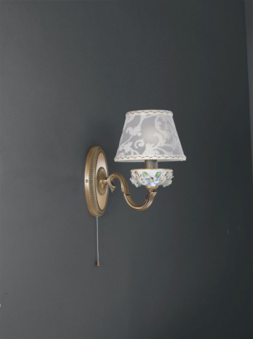 1 light brass and painted porcelain wall sconce with lamp shade