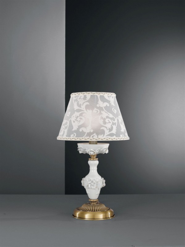 Brass bedside lamp with white porcelain and lamp shade