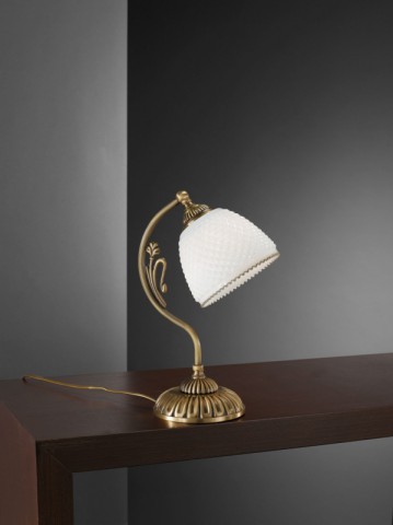 Brass bedside lamp with white blown glass