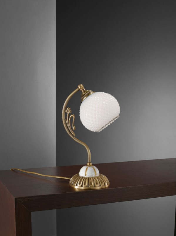 Brass and wood bedside lamp with white blown glass
