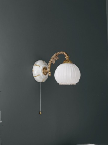 Golden brass wall sconce with white striped blown glass