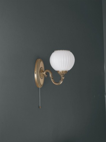 Brass wall sconce with white striped blown glass 1 light facing upward