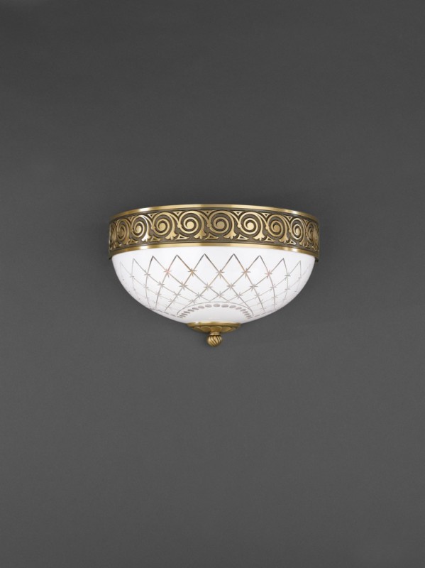 Brass and white engraved glass wall sconce