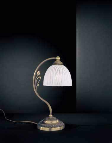 Brass bedside lamp with white striped glass
