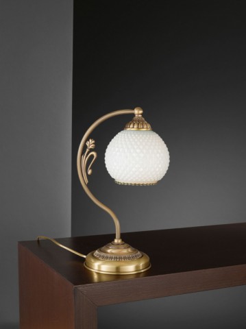 Brass bedside lamp with white blown glass