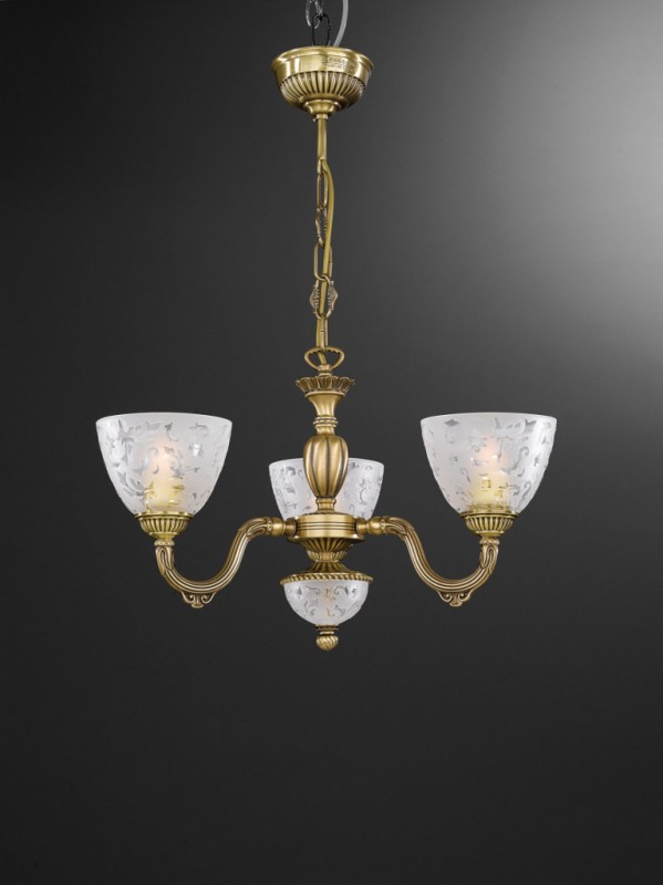 3 light brass chandelier with frosted glasses facing upward