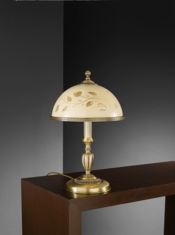 Brass table lamp with decorated cream glass
