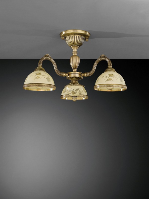 3 lights brass chandelier with decorated cream glasses