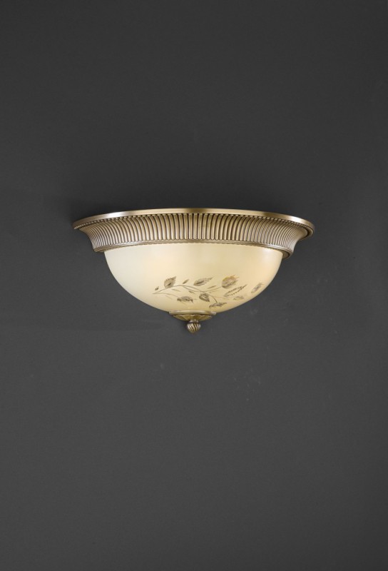 Brass and cream engraved glass wall sconce